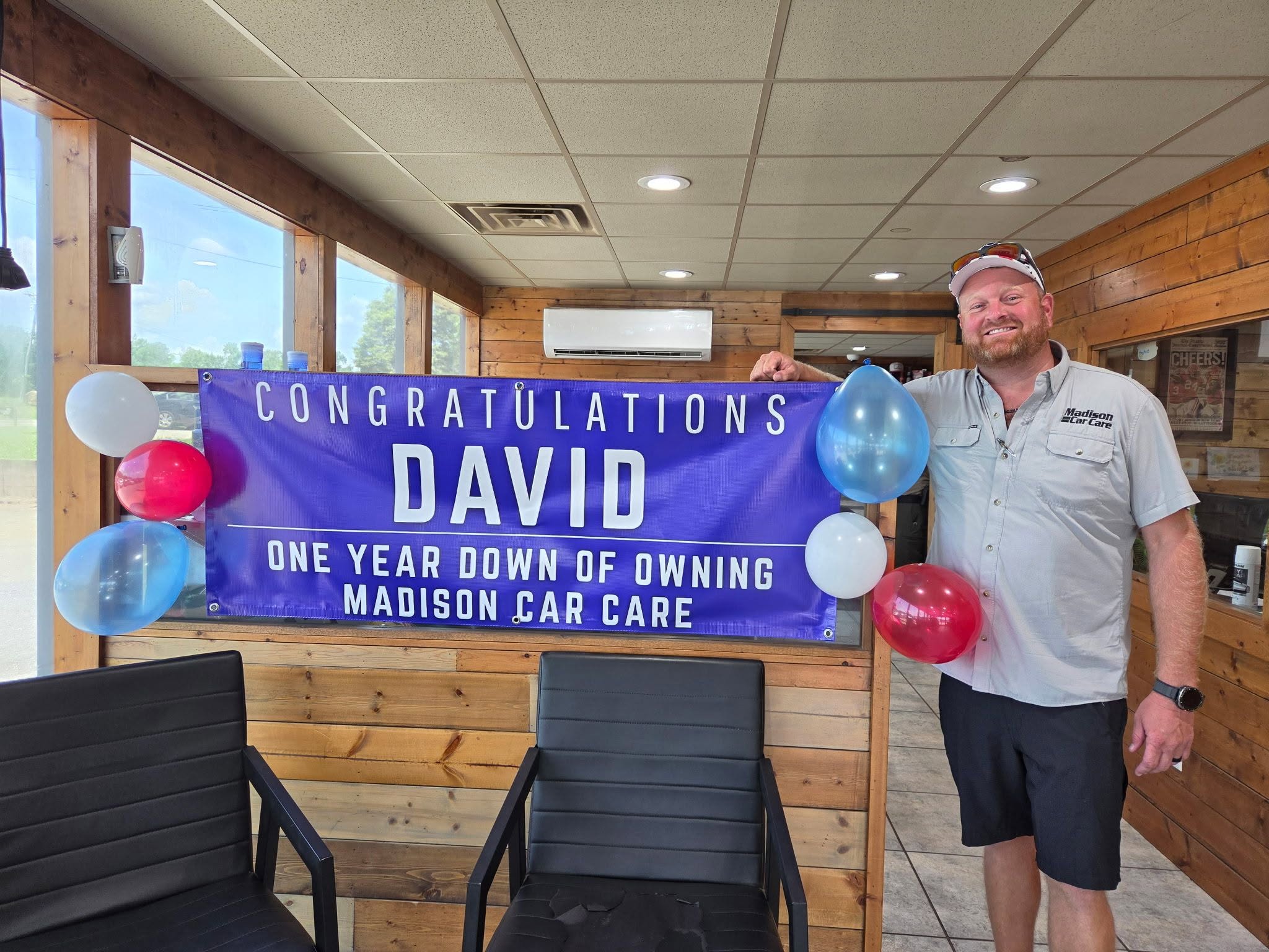 David, owner of Madison Car Care, in the shop customer area